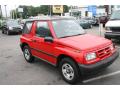 Front 3/4 View of 1997 Geo Tracker Soft Top 4x4 #3