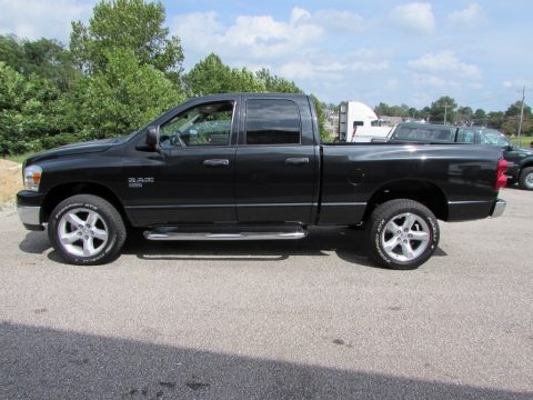 Brilliant Black Crystal Pearl Dodge Ram 1500 SLT Quad Cab 4x4.  Click to enlarge.