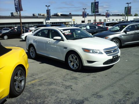 White Suede Metallic Ford Taurus SEL.  Click to enlarge.