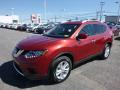 Front 3/4 View of 2016 Nissan Rogue SV AWD #10