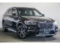 Front 3/4 View of 2017 BMW X1 sDrive28i #12