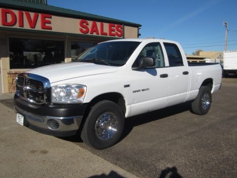 Bright White Dodge Ram 1500 ST Quad Cab 4x4.  Click to enlarge.