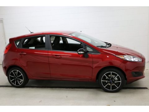 Ruby Red Metallic Ford Fiesta SE Hatchback.  Click to enlarge.