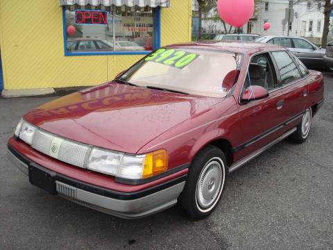 Bright Red Pearl Metallic Mercury Sable GS Sedan.  Click to enlarge.