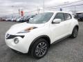 Front 3/4 View of 2017 Nissan Juke SL AWD #11