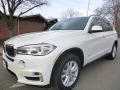 Front 3/4 View of 2014 BMW X5 xDrive35i #1