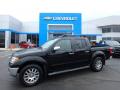 Front 3/4 View of 2010 Nissan Frontier LE Crew Cab 4x4 #1