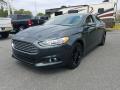 Front 3/4 View of 2016 Ford Fusion SE #1