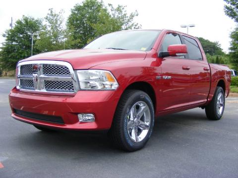 Inferno Red Crystal Pearl 2009 Dodge Ram 1500 Sport Crew Cab with Dark Slate 