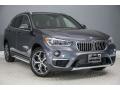 Front 3/4 View of 2017 BMW X1 xDrive28i #12