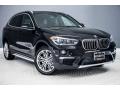 Front 3/4 View of 2017 BMW X1 sDrive28i #12