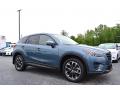 Front 3/4 View of 2016 Mazda CX-5 Grand Touring #1
