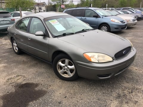 Arizona Beige Metallic Ford Taurus SES Sedan.  Click to enlarge.