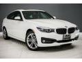 Front 3/4 View of 2017 BMW 3 Series 330i xDrive Gran Turismo #12