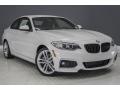 Front 3/4 View of 2017 BMW 2 Series 230i Coupe #12