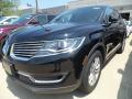 Front 3/4 View of 2017 Lincoln MKX Premier #1