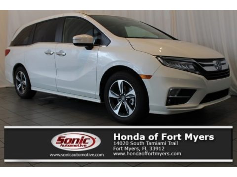 White Diamond Pearl Honda Odyssey Touring.  Click to enlarge.