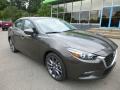 Front 3/4 View of 2018 Mazda MAZDA3 Touring 4 Door #3