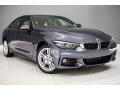Front 3/4 View of 2018 BMW 4 Series 430i xDrive Gran Coupe #12