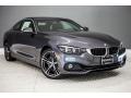 Front 3/4 View of 2018 BMW 4 Series 430i Coupe #12