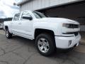 Front 3/4 View of 2018 Chevrolet Silverado 1500 LTZ Crew Cab 4x4 #8