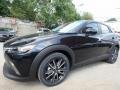 Front 3/4 View of 2018 Mazda CX-3 Touring AWD #4