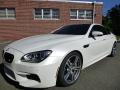 Front 3/4 View of 2015 BMW M6 Gran Coupe #1