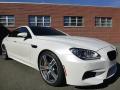 Front 3/4 View of 2015 BMW M6 Gran Coupe #7