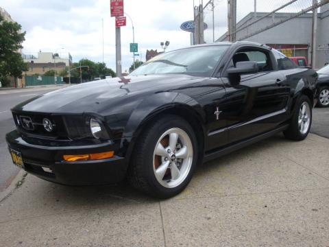 Black Ford Mustang V6 Deluxe Coupe.  Click to enlarge.