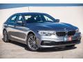 Front 3/4 View of 2018 BMW 5 Series 530i Sedan #12