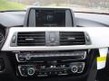 Controls of 2018 BMW 3 Series 320i xDrive Sedan #15