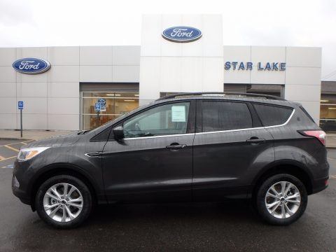 Magnetic Ford Escape SE 4WD. Click to enlarge. Magnetic Ford Escape SE 4WD. Click to enlarge.