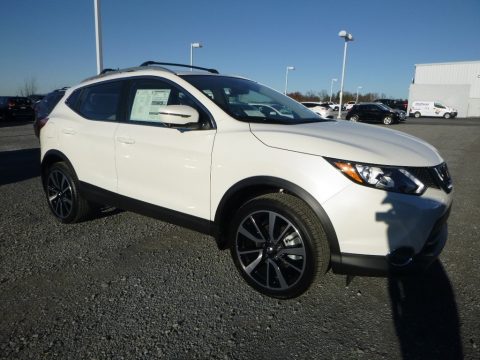 Pearl White Nissan Rogue Sport SL AWD.  Click to enlarge.