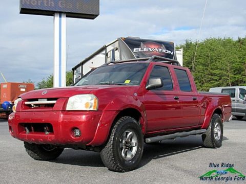 Red Brawn Metallic Nissan Frontier XE V6 Crew Cab 4x4.  Click to enlarge.