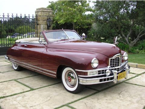 Garnet Red Packard Custom Eight Victoria Convertible.  Click to enlarge.