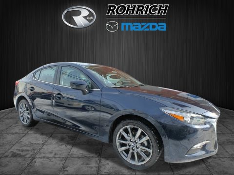 Deep Crystal Blue Mica Mazda MAZDA3 Touring 4 Door.  Click to enlarge.