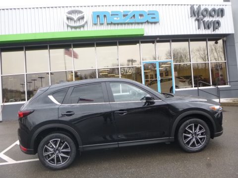 Jet Black Mica Mazda CX-5 Touring AWD. Click to enlarge. Jet Black Mica Mazda CX-5 Touring AWD. Click to enlarge.