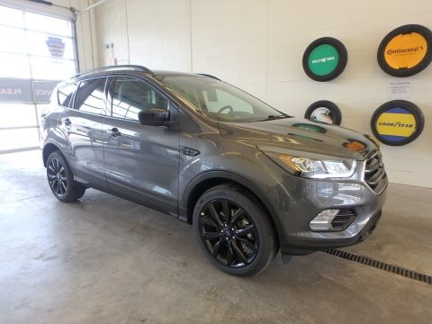 Magnetic Ford Escape SE 4WD. Click to enlarge. Magnetic Ford Escape SE 4WD. Click to enlarge.