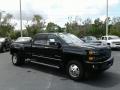 Front 3/4 View of 2018 Chevrolet Silverado 3500HD LTZ Crew Cab Dual Rear Wheel 4x4 #7