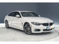 Front 3/4 View of 2019 BMW 4 Series 440i Gran Coupe #12