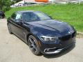 Front 3/4 View of 2019 BMW 4 Series 430i xDrive Convertible #9