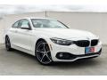 Front 3/4 View of 2019 BMW 4 Series 430i Coupe #12