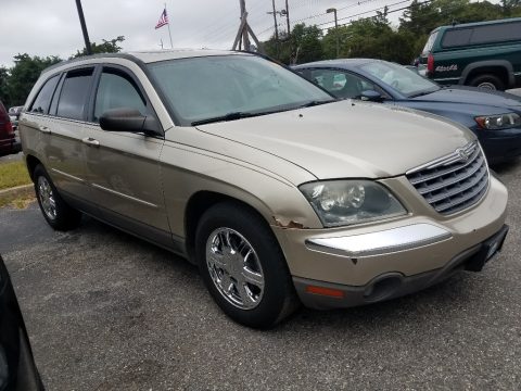 Linen Gold Metallic Pearl Chrysler Pacifica Touring AWD.  Click to enlarge.