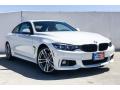 Front 3/4 View of 2019 BMW 4 Series 440i Coupe #12