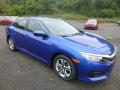 Front 3/4 View of 2018 Honda Civic LX Sedan #6