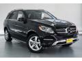 Front 3/4 View of 2019 Mercedes-Benz GLE 400 4Matic #12