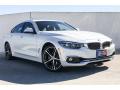 Front 3/4 View of 2019 BMW 4 Series 430i Gran Coupe #12