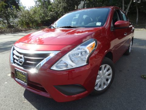 Cayenne Red Nissan Versa S.  Click to enlarge.