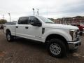 Front 3/4 View of 2019 Ford F350 Super Duty XLT Crew Cab 4x4 #9