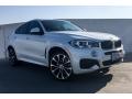 Front 3/4 View of 2019 BMW X6 xDrive35i #12